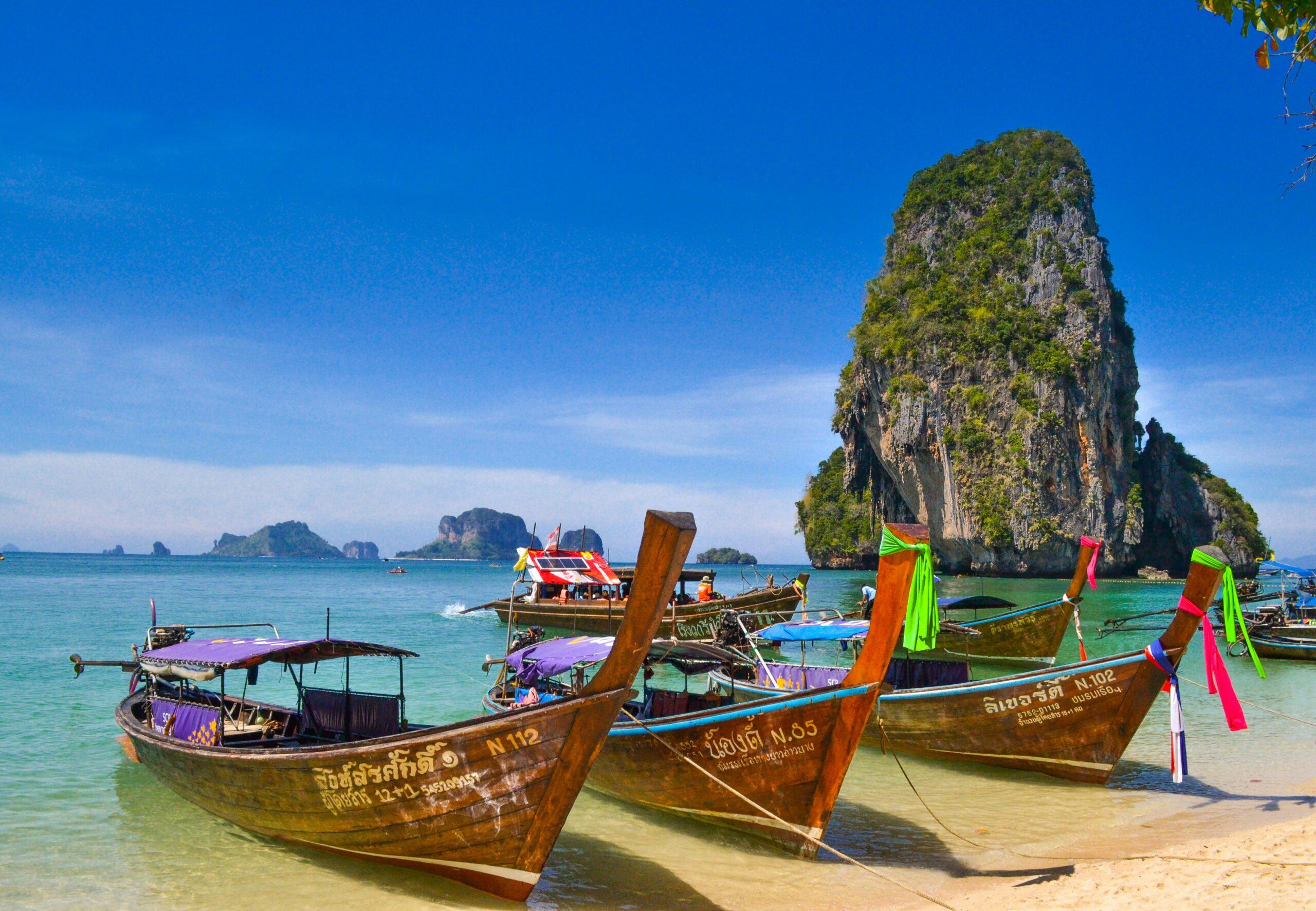 Phuket Krabi Thailand tour package - beach view with longtail boat